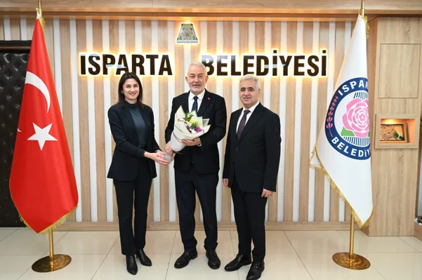 Isparta İl Defterdarı Mustafa Erdem beraberinde Defterdarlık Grup M&uuml;d&uuml;r&uuml; Barış