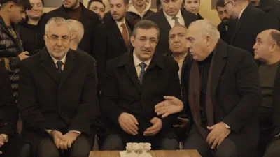 Cumhurbaşkanı Yardımcısı Yılmaz, &Ccedil;alışma ve Sosyal G&uuml;venlik Bakanı Vedat Işıkhan,